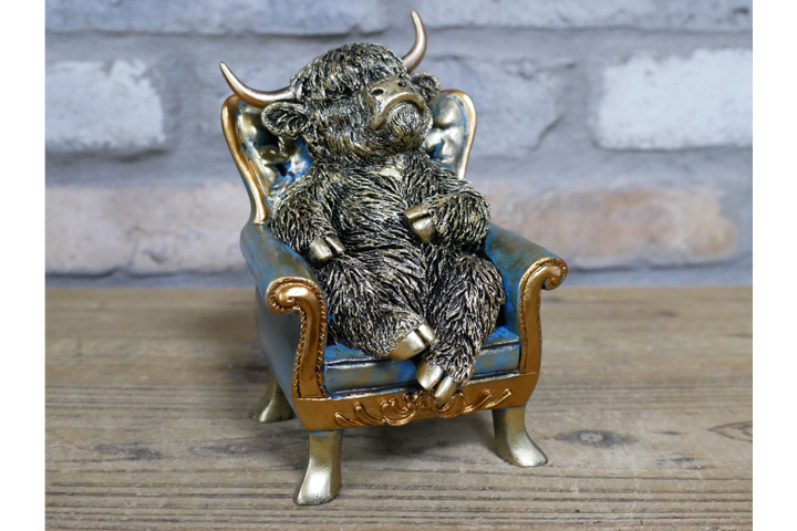 Highland Cow/dog sitting on Chair Antique Finish Figurine Resin Ornament