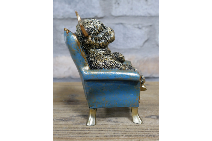 Highland Cow/dog sitting on Chair Antique Finish Figurine Resin Ornament