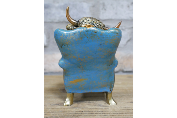 Highland Cow/dog sitting on Chair Antique Finish Figurine Resin Ornament