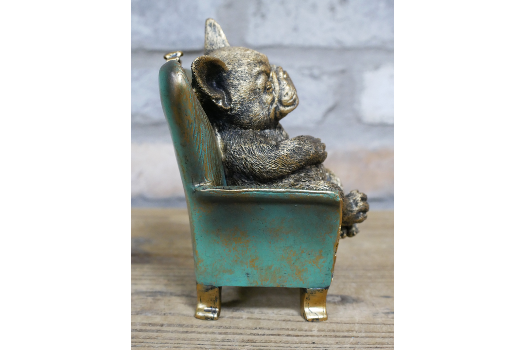 Highland Cow/dog sitting on Chair Antique Finish Figurine Resin Ornament