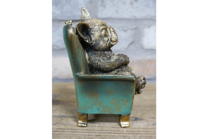 Highland Cow/dog sitting on Chair Antique Finish Figurine Resin Ornament