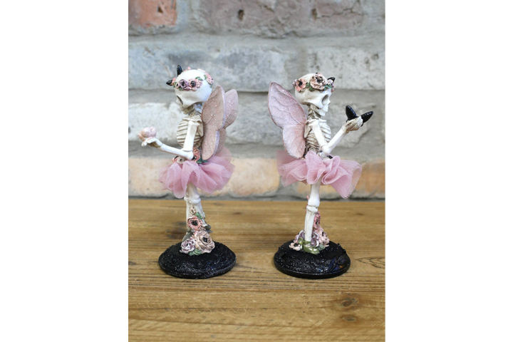 A set of Ballet Skeleton Figurine with Pink Tutu & Floral Details – Gothic Ballet Dancer Decor, Spooky Chic Home Ornament