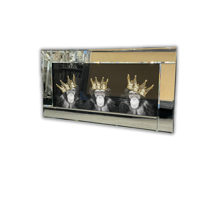 Royal Monkey Trio Adorned with Gold Crowns