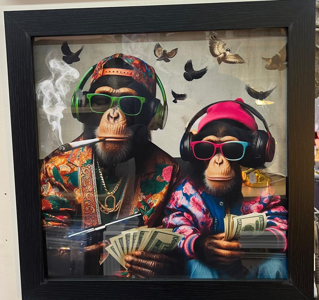 Black framed 2 monkeys with gun, dollars & wearing headphones wall art decor