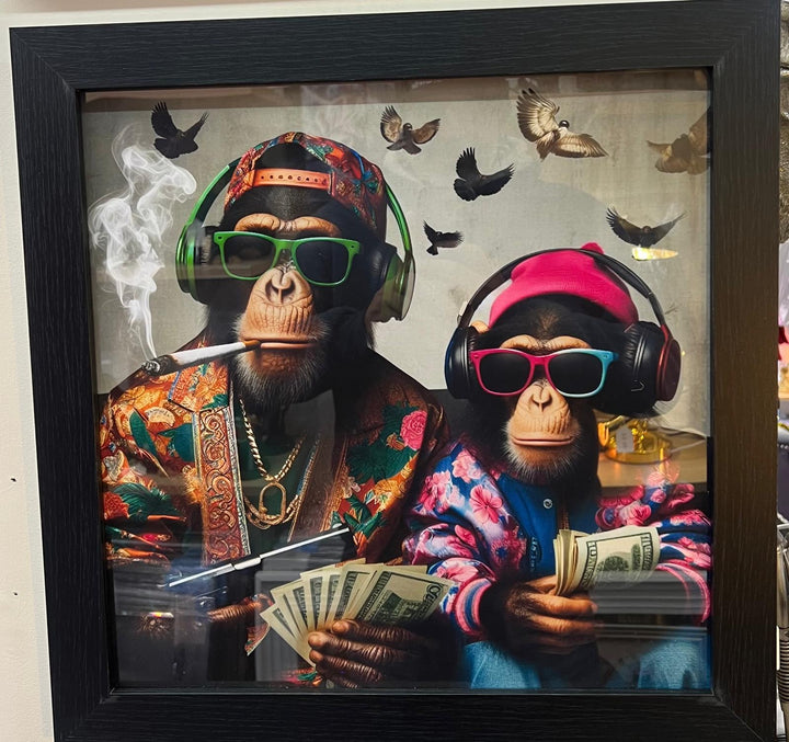Black framed 2 monkeys with gun, dollars & wearing headphones wall art decor