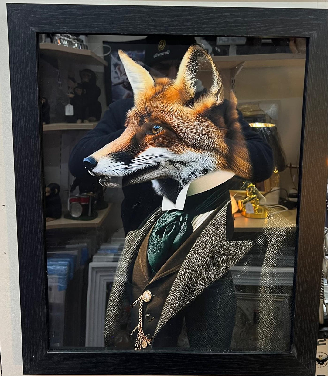 Black framed picture of fox dressed smart in suit wall art