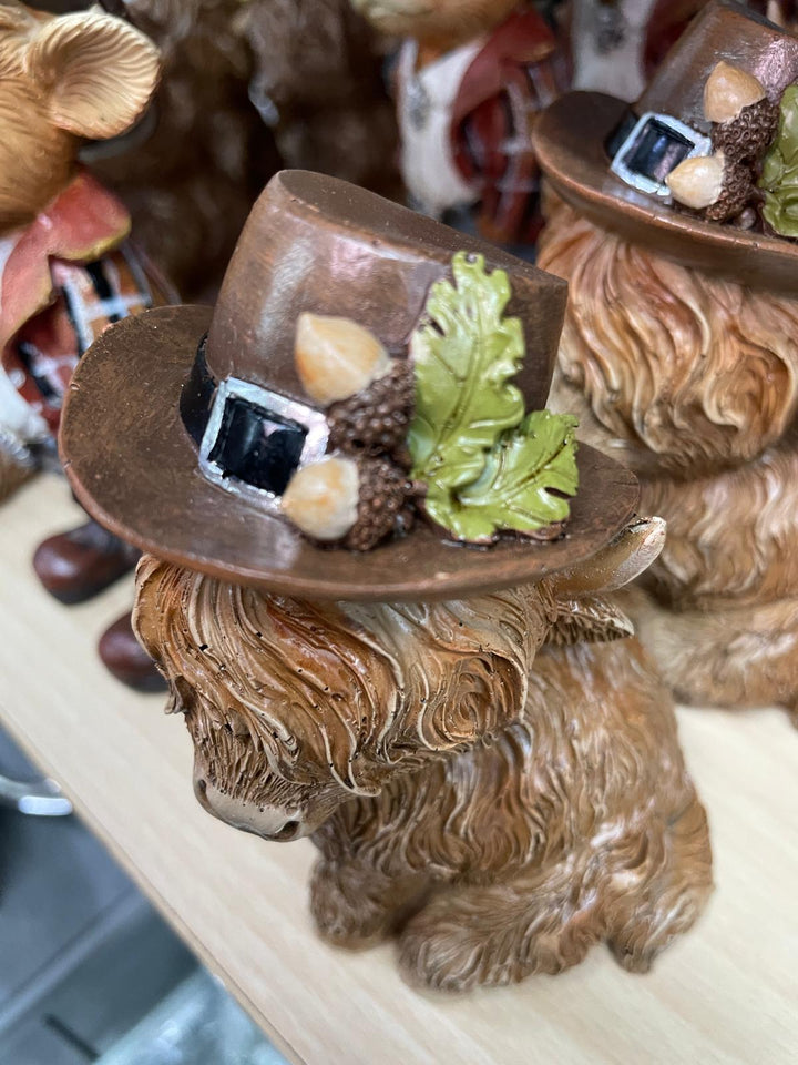 Brown Highland Cow with flowers on hat Ornament