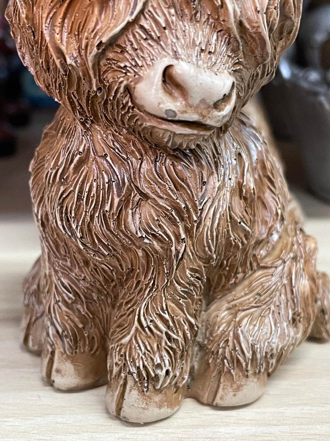 Brown Highland Cow with flowers on hat Ornament