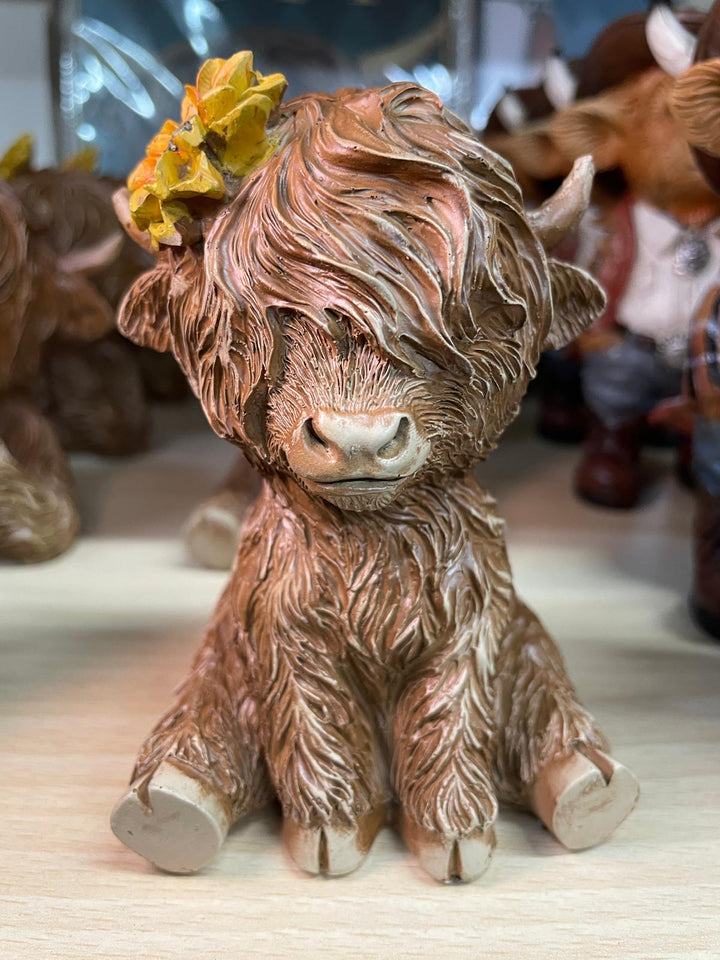 Brown Highland Cows with yellow sunflower on head Ornament