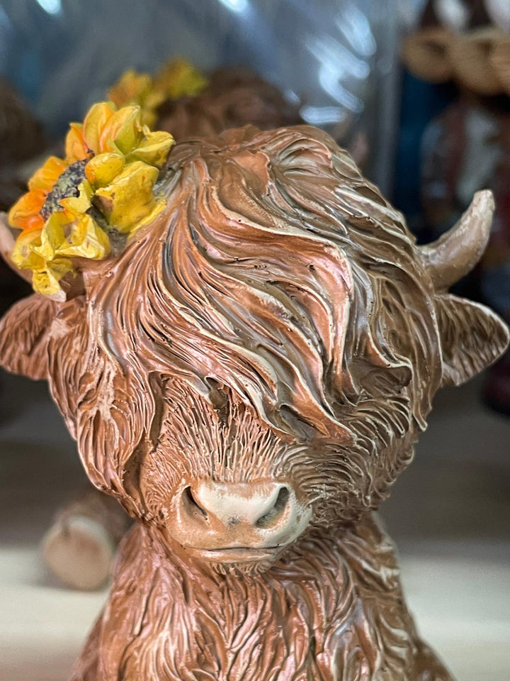 Brown Highland Cows with yellow sunflower on head Ornament