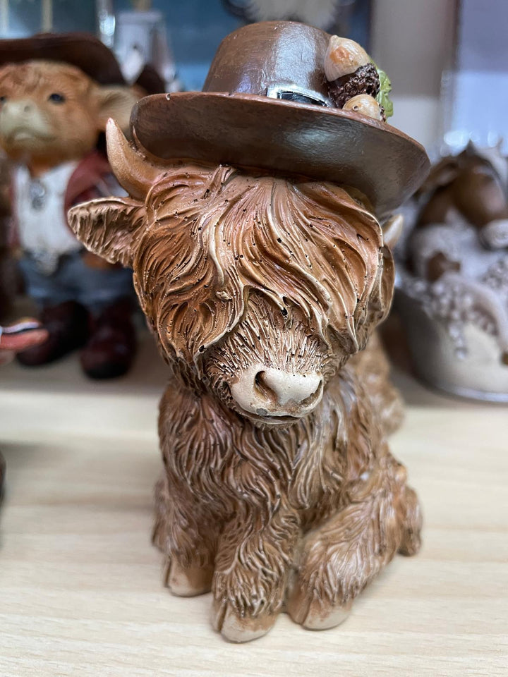 Brown Highland Cow with flowers on hat Ornament