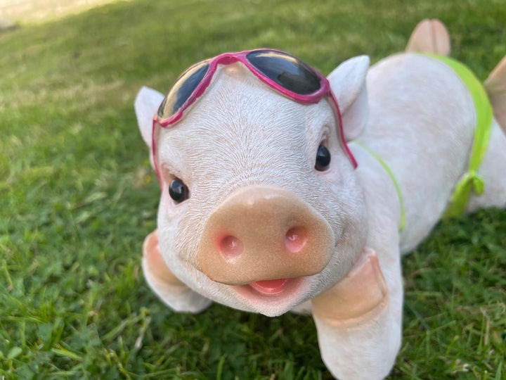 Pig in a bikini resin decorative laying lawn garden décor