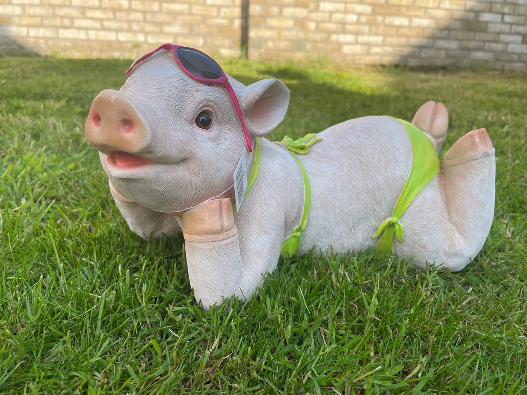 Pig in a bikini resin decorative laying lawn garden décor