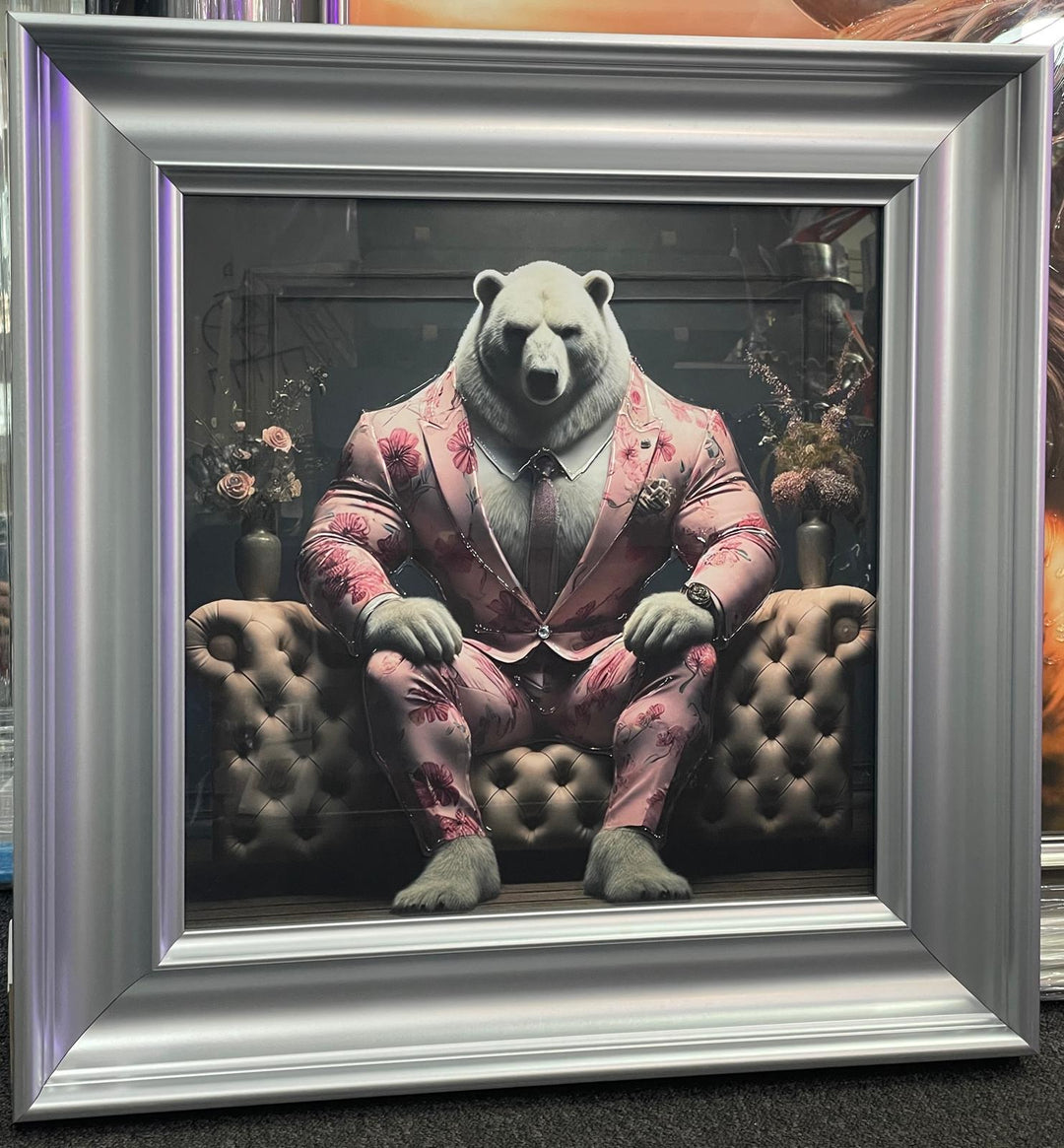Graphite Framed Polar Bear in Pink Floral Suit Sitting on Couch