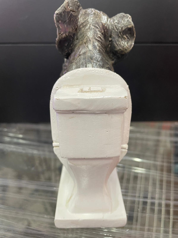 Elephant sitting on the loo with mobile phone quirky ornament