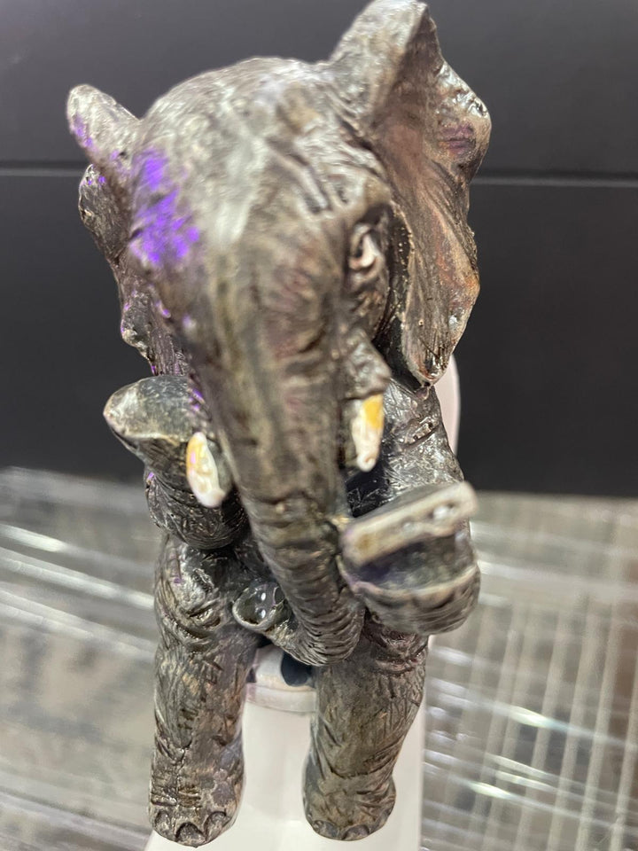 Elephant sitting on the loo with mobile phone quirky ornament