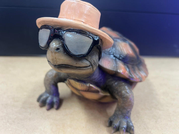 Holiday tortoise grey resin cheeky decorative ornament