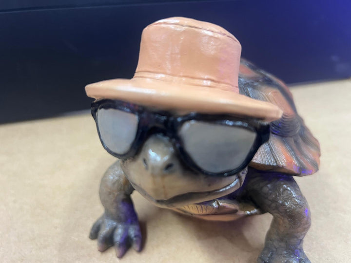 Holiday tortoise grey resin cheeky decorative ornament