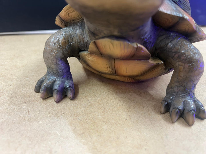 Holiday tortoise grey resin cheeky decorative ornament