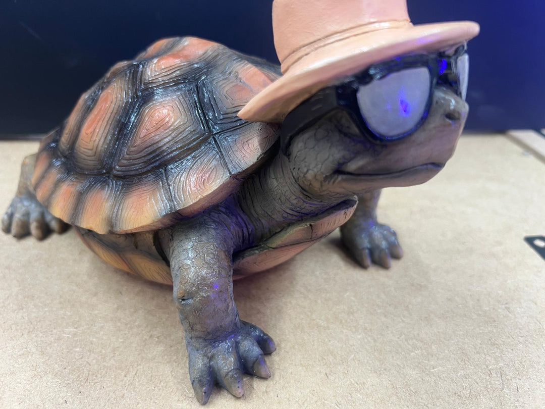 Holiday tortoise grey resin cheeky decorative ornament