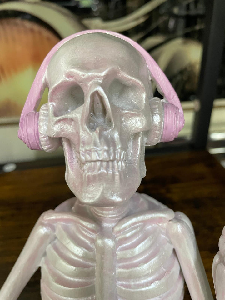 Skeleton with pink or blue headphones quirky ornament
