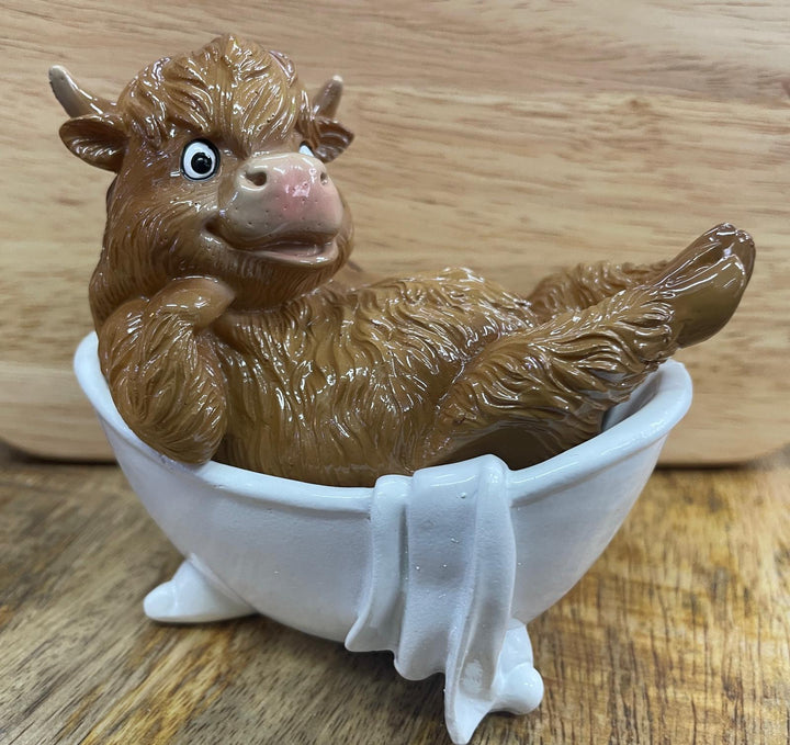Highland cow in tub & toilet with book quirky ornament