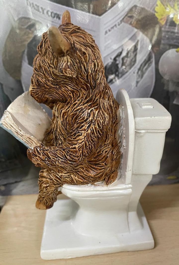 Highland cow in tub & toilet with book quirky ornament
