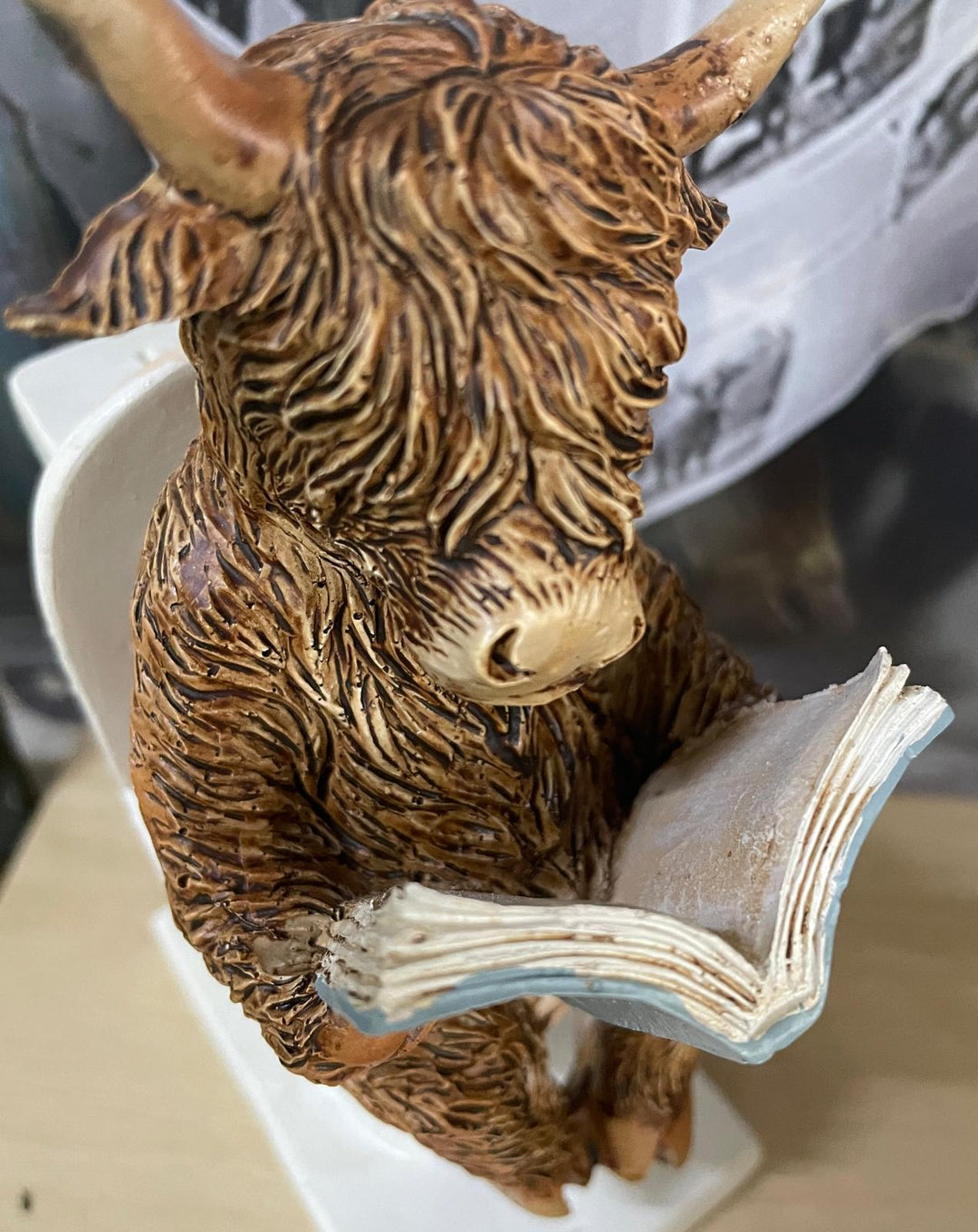 Highland cow in tub & toilet with book quirky ornament