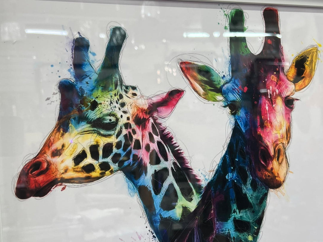 White framed intertwined Giraffes picture multi coloured wall art