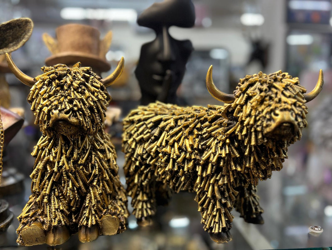 Bold Highland Cow gold rustic cattle ornament