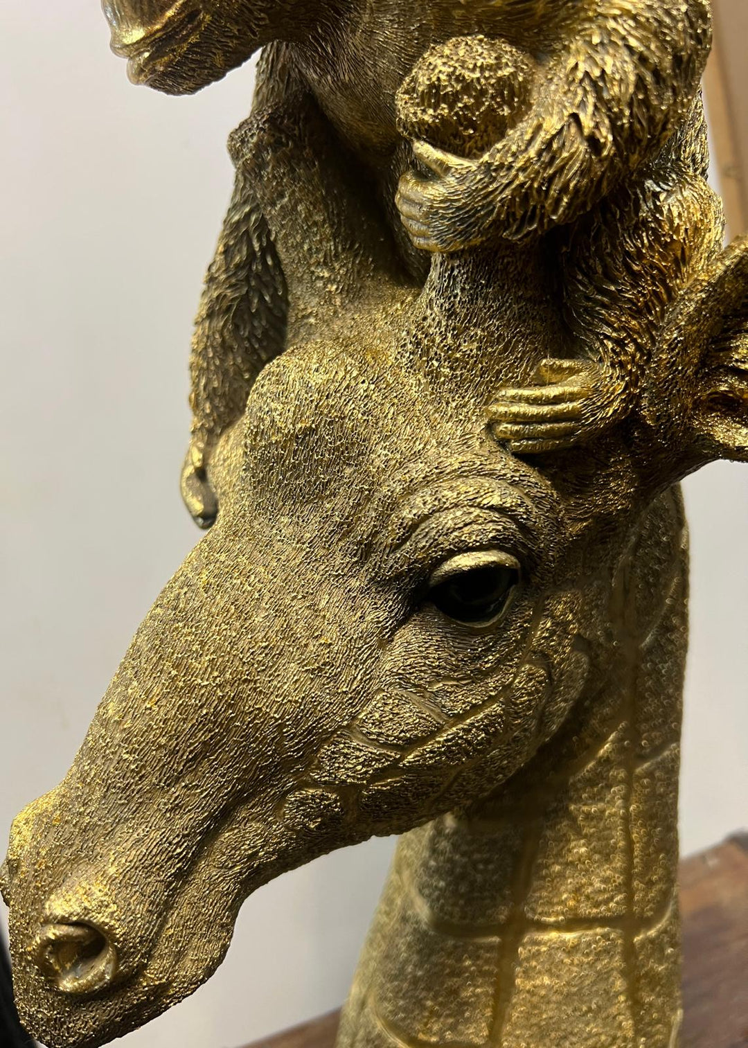 Monkey Sitting on Giraffe's Head Gold Resin Ornament – Unique Jungle Animal Décor