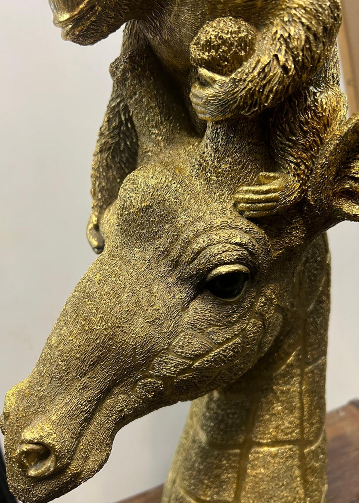 Monkey Sitting on Giraffe's Head Gold Resin Ornament – Unique Jungle Animal Décor