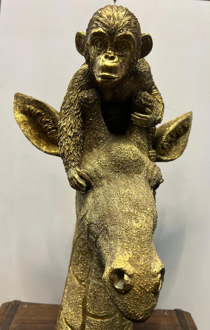 Monkey Sitting on Giraffe's Head Gold Resin Ornament – Unique Jungle Animal Décor