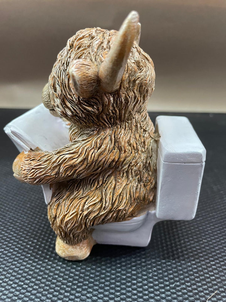 Highland cow in tub & toilet reading book quirky resin ornament
