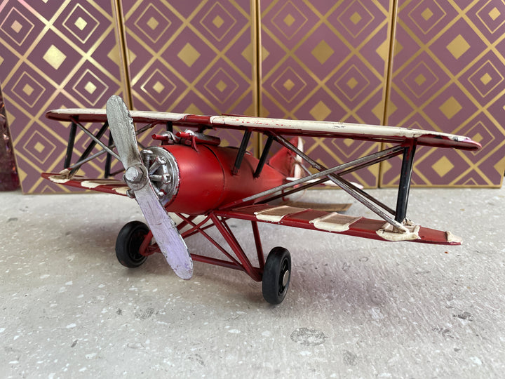 Red bi-plane retro tin vintage transport model