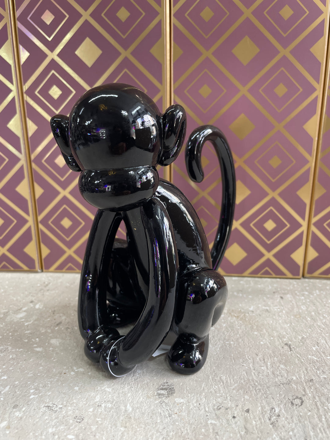 Black glossy sitting monkey resin ornament
