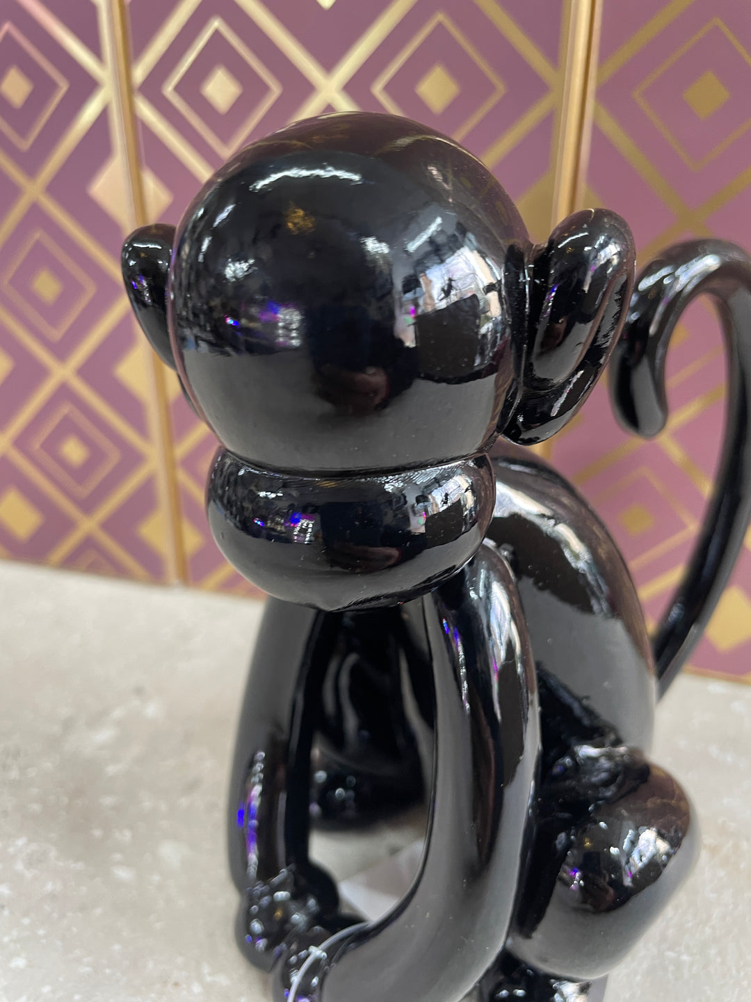 Black glossy sitting monkey resin ornament