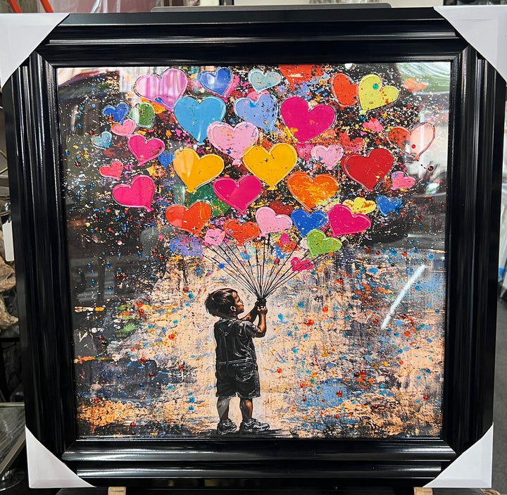 Banksy boy and girl holding colourful balloons black frame picture