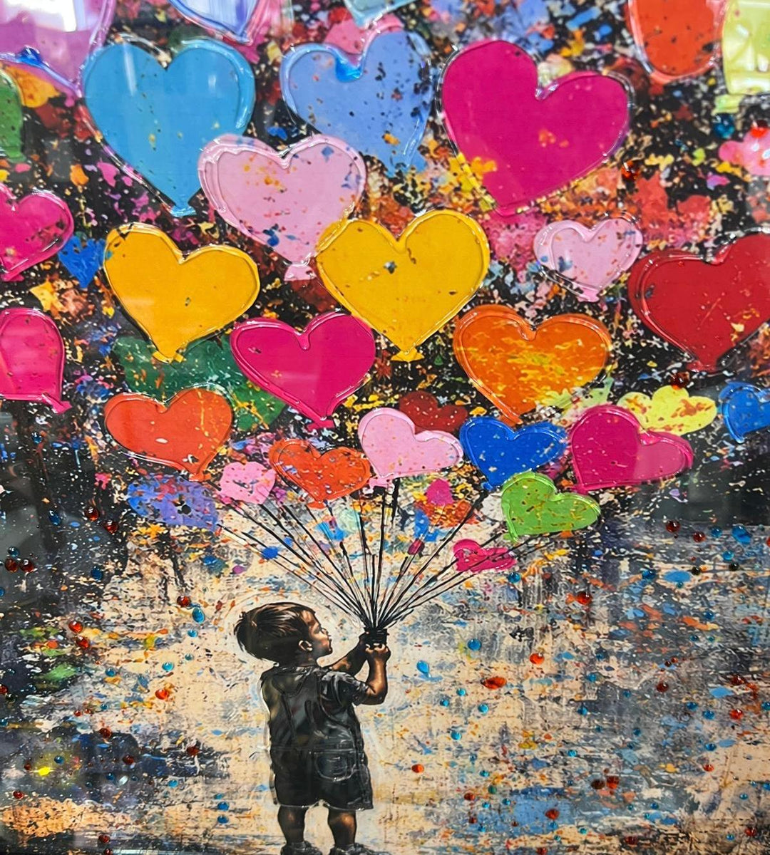 Banksy boy and girl holding colourful balloons black frame picture
