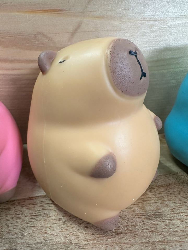 Stretchy Sand Filled Capybara Squishy – Soft Sensory Fidget Toy in Pink, Blue & Brown
