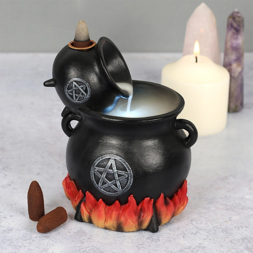 Pouring Cauldrons Backflow Incense Holder-Powered by 2 AA batteries and an on/off switch.