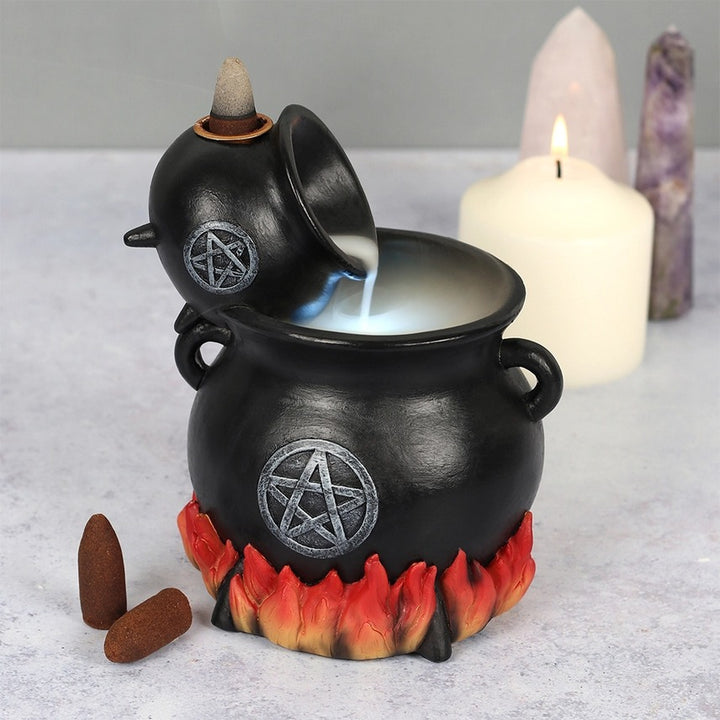 Pouring Cauldrons Backflow Incense Holder-Powered by 2 AA batteries and an on/off switch.