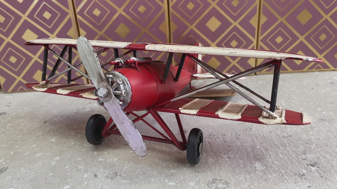 Red bi-plane retro tin vintage transport model