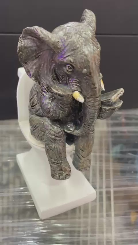 Elephant sitting on the loo with mobile phone quirky ornament