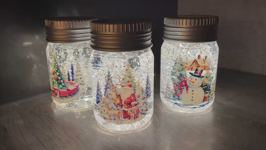 14cm LED Lit Christmas Spinner Jars Festive Decorations Santa, Snowman, train
