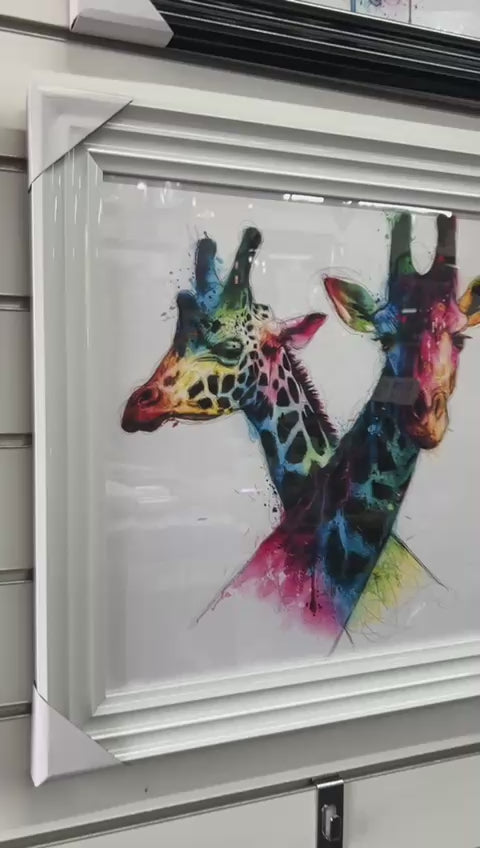 White framed intertwined Giraffes picture multi coloured wall art