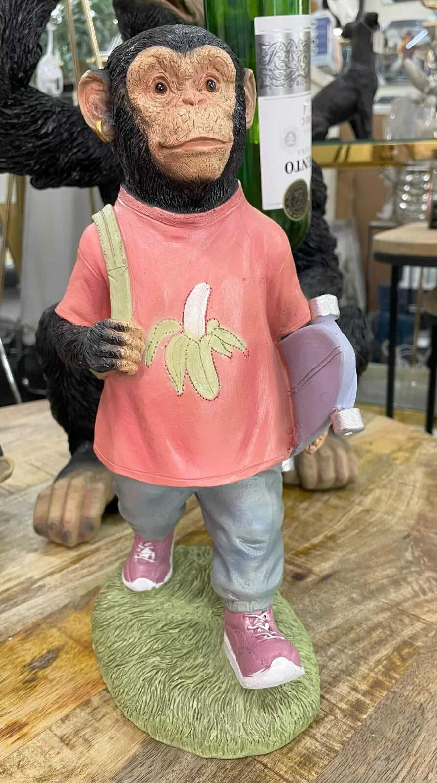 Monkey skateboarding with bagpack ornament