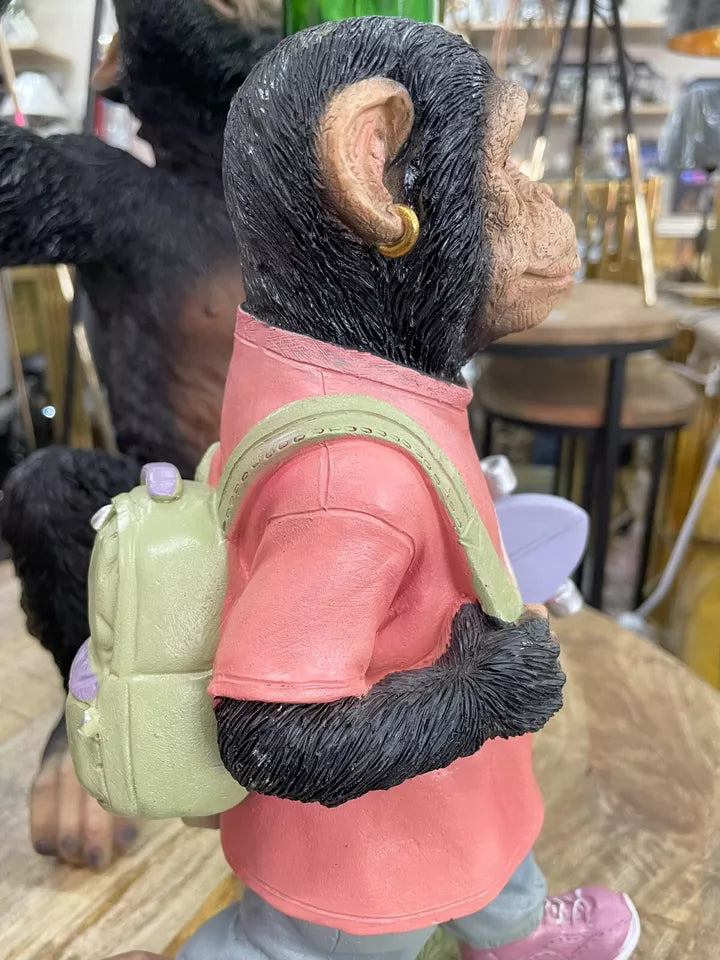 Monkey skateboarding with bagpack ornament