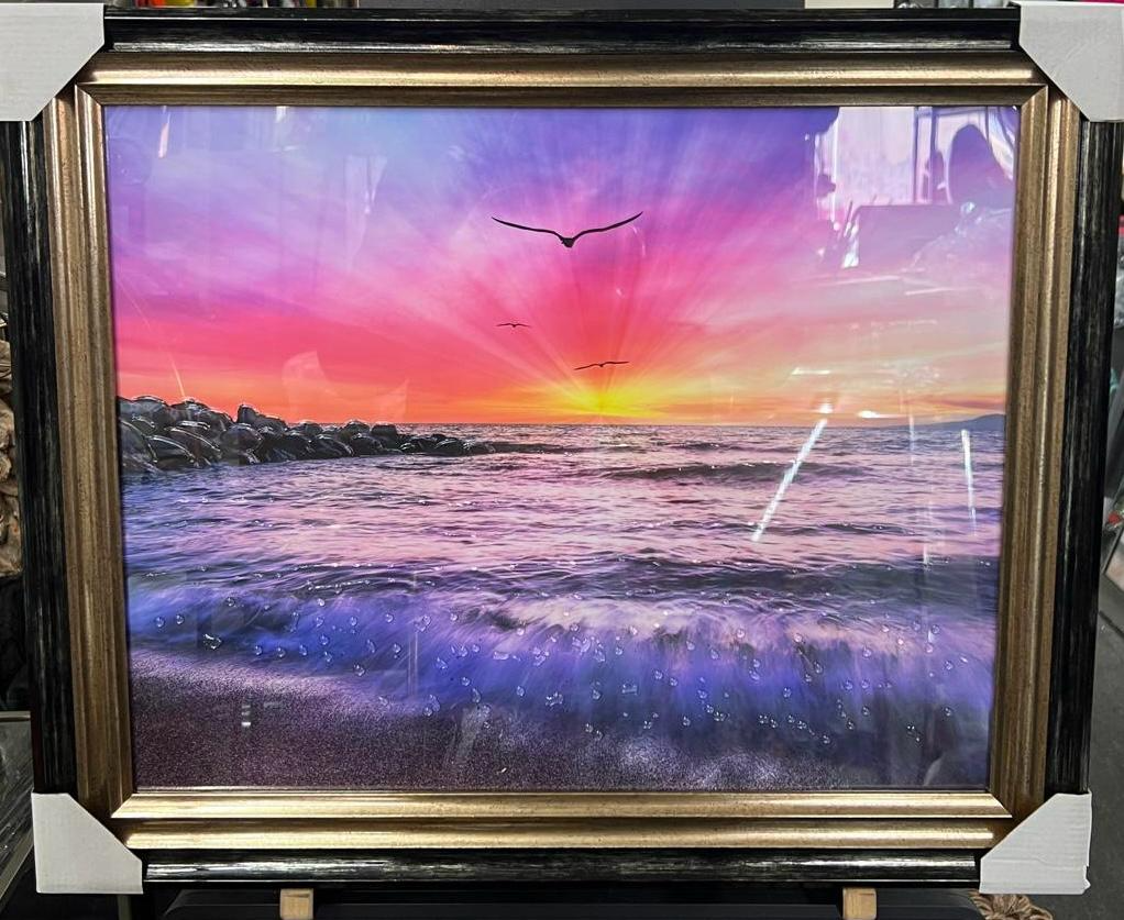 Sunset on the beach with birds flying, liquid art resin, two tone black and gold frame